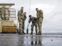 U.S. Air Force Airmen assigned to the 435th Contingency Response Squadron, and Royal Air Force airmen assigned to the 90 Signals Unit, communicate via radio at Ramstein Air Base, Germany, Feb. 9, 2024. The 1st CBCS, alongside RAF personnel, attempted their longest radio connection through a deployable HF radio system, extending their global reach and communication capabilities in contested environments. (U.S. Air Force photo by Senior Airman Madelyn Keech)