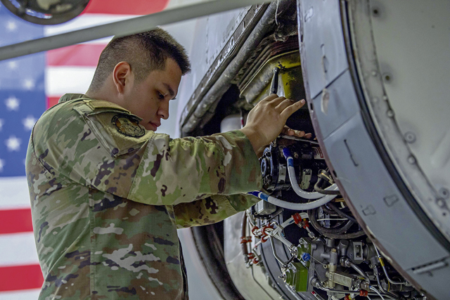 U.S. Air Force Airman 1st Class Maximiliano Montes, 86th Aircraft Maintenance Squadron C-130J Super Hercules aircraft maintenance journeyman, inspects components of a C-130J at Ramstein Air Base, Germany, Feb. 9, 2024. Montes competed in the second annual 86th Maintenance Group Aerospace Maintenance Competition. (U.S. Air Force photo by Airman 1st Class Eve Daugherty)