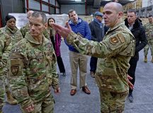 U.S. Air Force Brig. Gen. Christopher Leonard, U.S. Air Forces in Europe director of logistics, engineering and force protection, listens to a briefing from Tech. Sgt. Francisco Natalimunera, 86th Materiel Maintenance Squadron armament flight chief, at the Warehouses Service Agency in Sanem, Luxembourg, Feb. 8, 2024. Leonard familiarized himself with the facility to better understand the warehouse and its significance to regional and global posturing and allies. (U.S. Air Force photo by Senior Airman Thomas Karol)