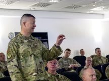 U.S. Air Force Col. Jason Wolff, 86th Logistics Readiness Group commander, offers a question to leadership during the 2025 U.S. Air Forces in Europe and Air Forces Africa Mission Support and Maintenance Group Strategy Conference at Ramstein Air Base, Germany, Jan. 22, 2025. The conference was tailored to equip senior leaders within USAFE-AFAFRICA on how best to operate within the theater, focusing specifically on strategic thinking and institutional leadership. (U.S. Air Force photo by Senior Airman Renan Arredondo)
