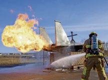 U.S. Air Force Senior Airman Colin Porter, 355th Civil Engineer Squadron firefighter, puts out a simulated fire during exercise Silver Flag at Ramstein Air Base, Germany, March 20, 2025. This exercise brought multiple squadrons together, allowing Airmen to become familiar with processes that may happen in real-world situations. (U.S. Air Force photo by Airman 1st Class Trevor Calvert)