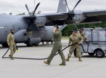 U.S. Airmen assigned to the 86th Airlift Wing prepare a C-130J Super Hercules aircraft for flight during exercise Hussar Saber at 33rd Air Base, Poland, Sept. 8, 2025. Hussar Saber focused on strengthening the ability to rapidly deploy and sustain operations through collaborative work with NATO Allies and partners. Forces were forward postured with the resources and infrastructure necessary to combat current and future threats. (U.S. Air Force photo by Senior Airman Trevor Calvert)