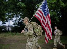 A U.S. Air Force Airman participates in a remembrance ruck to honor the lives lost during the 9/11 terrorist attacks during a memorial held at Ramstein Air Base, Germany, Sept. 11, 2025. Over 200 members from the Kaiserslautern Military Community walked or rucked either three or six kilometers to honor the first responders who gave their lives in the line of duty. (U.S. Air Force photo by Senior Airman Edgar Grimaldo)