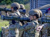 U.S. Air Force security forces Airmen aim AT4 rocket launcher simulators during a heavy weapons training at U.S. Army Garrison Baumholder, Germany, Sept. 18, 2025. The Airmen used various weapons during the training to help the students prepare for different situations they may face on the battlefield. (U.S. Air Force photo by Airman 1st Class Jason Jones Jr.)