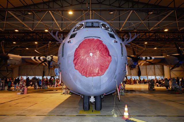 A U.S. Air Force C-130J Super Hercules aircraft is decorated in the holiday spirit during a Rudolph the Red-Nosed Herc event at Ramstein Air Base, Dec. 5. As part of an annual tradition, a C-130J is decorated to look like Rudolph the red-nosed reindeer. Photo by Airman Paden Henry