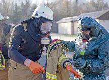 Airmen assigned to the 86th Civil Engineer Squadron begin the decontamination process during an ammonia leak exercise at Ramstein Air Base, Germany, Nov. 22, 2025. The exercise cultivated cooperation between German and American firefighters and increased knowledge of the equipment utilized by both, furthering their ability to support the Kaiserslautern military community. (U.S. Air Force photo by Senior Airman Vaughn Weber)