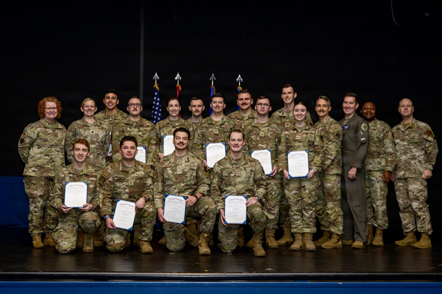 Gallant Unit Citation recipients pose for a photo with 86th Airlift Wing leadership following a Gallant Unit Citation ceremony at Ramstein Air Base, Germany, Dec. 5, 2025. The citation recipients deployed in support of the 386th Air Expeditionary Wing, which earned the citation for conducting combat operations in the U.S. Central Command area of responsibility from April 2 to Oct. 6, 2025. Airmen from the 37th Airlift Squadron and 86th Aircraft Maintenance Squadron supported through a short-notice deployment augmenting the 40th Expeditionary Airlift Squadron. (U.S. Air Force photo by Senior Airman Brenden Beezley)