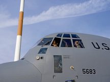 U.S. Air Force Senior Airman Logan Gibbs, 86th Aircraft Maintenance Squadron avionics journeyman, left, and Senior Airman Vanessa Hall, 86th AMXS avionics journeyman, right, discuss solutions with other Airmen inside a C-130J Super Hercules aircraft to help fix a throttle at Ramstein Air Base, March 24. Proper installation of the mounting bracket enhances system stability, helping maintain aircraft readiness and preventing in-flight component failure. Photos by Senior Airman Dylan Myers
