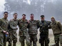 U.S. Air Force Airmen, Army Soldiers, and Bundeswehr Senior Master Sgt. Brian Wagner, event coordinator, pose for a group photo after completing their final challenge during the German and American Friendship Days at Ramstein Air Base, Feb. 26. After completing swimming, marksmanship, and a German physical fitness test, members finished with a timed 12 kilometer ruck. These events tested members’ endurance, skill and resilience across multiple disciplines. By the end of week, 221 badges were awarded to those who successfully passed each trial in accordance with German military standards.