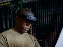 U.S. Airmen and Soldiers from the 724th Air Mobility Squadron, 725th AMS, and 173d Airborne Brigade participate in a Joint Inspection HoloLens demo in Vicenza, Italy, Aug. 28, 2025. A JI is a critical process of preparing cargo to ensure safety and readiness for transport on military aircraft, which occurs almost daily across the 521st Air Mobility Operations Wing. (U.S. Air Force photo by Staff Sgt. Brennan Sokowoski)