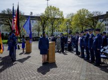 Airmen assigned to the 86th Airlift Wing and the 76th Airlift Squadron stand at attention during the presenting of colors for the 30th annual remembrance ceremony in honor of the fallen crew members of Implementation Force-21 Ramstein Air Base, Germany, April 9, 2026. The April 3, 1996 accident prompted sweeping Air Force safety improvements that fundamentally changed the way military aircraft operate, establishing new standards and requirements that have since protected countless aircrew and passengers on missions around the world. (U.S. Air Force photo by Senior Airman Trevor Calvert)