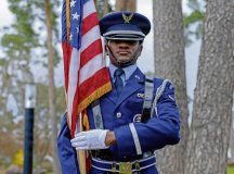 U.S. Air Force Airman 1st Class Maleik Findley, 786th Civil Engineer Squadron power production technician, stands at port arms after a memorial service on Ramstein Air Base, Germany, March 17, 2026. The base honor guard serves as a visible representation of the military’s values, discipline and tradition. (U.S. Air Force photo by Senior Airman Jason Jones Jr.)