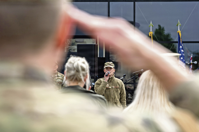 U.S. Air Force Staff Sgt. Dana Bowers, Air Forces in Europe, Air Forces Africa Band  regional band vocalist, sings the U.S. national anthem during Military Spouse Appreciation Day at Ramstein Air Base, Germany, May 8, 2026. The annual recognition celebrates the commitment and enduring support military spouses provide throughout every stage of military service. (U.S. Air Force photo by Airman Paden Henry)