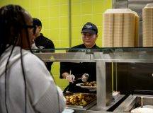 U.S. Air Force Airman 1st Class Natalie Harris, 786th Force Support Squadron food services specialist, fills a plate of food for a member of the Kaiserslautern Military Community at Ramstein Air Base, May 3. The mission of the 786th FSS is focused on readiness, personnel services and morale. Photo by Senior Airman Vaughn Weber