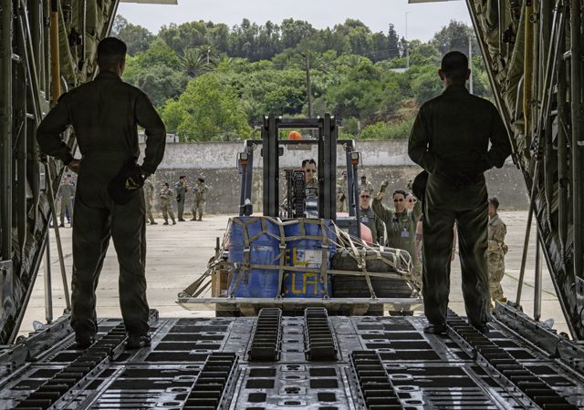 U.S. Air Force Senior Airman Jeffrey Tan, a load joint inspection representative, begins to load gear onto a Royal Moroccan Air Force C-130H to demonstrate engine running on and offloading procedures during Africa Lion 26 at 3rd Royal Moroccan Air Base, Kenitra, Morocco, April 27, 2026. The demonstration enhanced operational safety by standardizing hand signals and improving multinational coordination during engine running on- and offloading procedures.

AL26 is U.S. Africa Command's largest annual joint exercise, designed to strengthen collective security capabilities of the U.S., African nations and global allies. Led by U.S. Army Southern European Task Force, Africa (SETAF-AF) from April 20 to May 8, 2026, and hosted in Ghana, Morocco, Senegal and Tunisia, AL26 involves over 5,600 civilian and military personnel from more than 40 nations, using innovation to drive partner-led regional security. (U.S. Air Force photo by Staff Sgt. Nash Truitt)