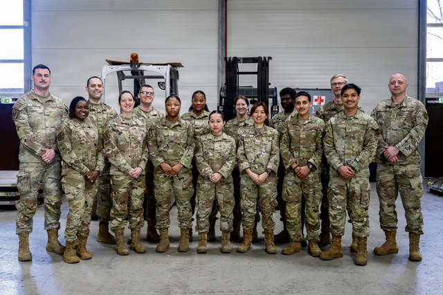 Airmen assigned to the 86th Medical Support Squadron pose for a group photo at Ramstein Air Base, Germany, April 7, 2026. The 86th MDSS sustains critical medical readiness by maintaining equipment and supplies that enable immediate response to contingency operations. (U.S. Air Force photo by Airman 1st Class Rebecca Harima)