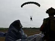 Members of the 406th Air Expeditionary Wing conduct evening military freefall training over Djibouti, May 2, 2026. Operating from the African continent requires highly adaptable forces capable of projecting rescue support across distances at a moment's notice. (U.S. Air Force photo by Master Sgt. Carlin Leslie)