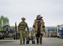 U.S. Air Force Senior Airman Cameron Poe, left, 786th Civil Engineer Squadron explosive ordnance disposal team member and Staff Sgt. Christian Brown, 786th CES EOD team leader, walk towards a simulated improvised explosive device at Ramstein Air Base, Germany, May 28, 2026. EOD forces provide full-spectrum response capability to incidents involving chemical, biological, radiological and nuclear hazards during contingencies to validate a unit's ability to scale that response across the European theater. (U.S. Air Force photo by Senior Airman Dylan Myers)