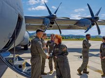 U.S. Air Force Brig. Gen. Adrienne Williams, 86th Airlift Wing commander, thanks the 37th Airlift Squadron aircrew after her final flight prior to relinquishing command and retirement over Normandy, France, at Ramstein Air Base, Germany, June 7, 2026. During her 30-year Air Force career, Williams served as a master C-130 navigator and commander at multiple echelons across the mobility enterprise. (U.S. Air Force photo by Tech. Sgt. Cynthia Belío)