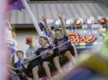 Families from the Kaiserslautern Military Community ride a carnival attraction during Freedom Fest at Ramstein Air Base, Germany, July 4, 2026. The two-day fest brought together service members and families from the KMC in a shared celebration of partnership and 250 years of American independence. (U.S. Air Force photo by Airman 1st Class Joseph Curzi)