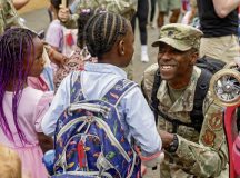 A parent drops off their children for the first day of school at Ramstein Air Base, Germany, Aug. 17, 2026. Families arrived for the first day of school drop off to encourage and support students as they begin the new school year. (U.S. Air Force photo by Senior Airman Jason Jones Jr.)