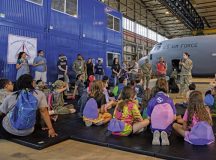 U.S. Air Force Master Sgt. Nichole Jimenez, MFRC readiness senior noncommissioned officer, gives participants of Operation H.E.R.O. a mission brief for their mock deployment at Ramstein Air Base, Germany, Aug. 1, 2026. Operation H.E.R.O. was a program specifically designed for children of the Kaiserslautern Military Community to help families of military members understand the deployment process. (U.S. Air Force photo by Airman 1st Class Michelle Sies)