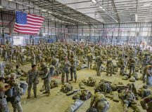 U.S. Army paratroopers prepare for a joint forcible entry operation during exercise Saber Junction 26 at Ramstein Air Base, Germany, Aug. 26, 2026. The exercise event integrated U.S. Army airborne forces with U.S. Air Force and Marine Corps aircrews to rehearse the coordination required to rapidly project combat power by air. (U.S. Air Force photo by Senior Airman Brenden Beezley)