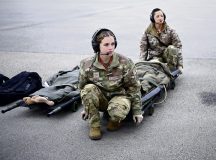 U.S. Air Force Senior Airman Rogan Jones, 86th Aeromedical Evacuation Squadron aeromedical evacuation technician, left, and U.S. Air Force Tech. Sgt. Diandra Velasquez, 86th Aeromedical Evacuation Squadron aeromedical evacuation technician, prepare to carry a litter onto an aircraft during exercise Northern Viking 26 at Keflavík Air Base, Iceland, Aug. 26, 2026. NV26 strengthens interoperability and force readiness among the U.S., Iceland and Allied nations, enabling multi-domain command and control of joint and coalition forces defending Iceland and defending the increasingly contested Arctic and North Atlantic. (U.S. Air Force photo by Staff Sgt. Johnny Foister)