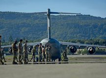 U.S. Airmen assigned to the 86th Aircraft Maintenance Squadron check for foreign object debris near a transient C-17 Globemaster III on the flightline at Ramstein Air Base, Germany, Sept 15, 2026. A FOD walk is a visual sweep of the flightline to remove debris left behind that could potentially be ingested into an aircraft, causing damage, mission failure or even death, ensuring the Global Gateway is ready to provide agile tactical airlift capabilities worldwide. (U.S. Air Force photo by Staff Sgt. Sabrina Fuller-Judd)